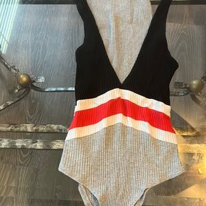 Bodysuit with plunging V cut